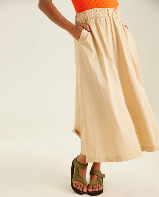 Beige coloured 100% cotton skirt, midi length with pockets